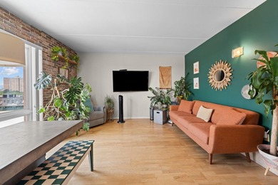 Welcome to 853 Macy Place #8E, a rare top-floor, corner - photo 2