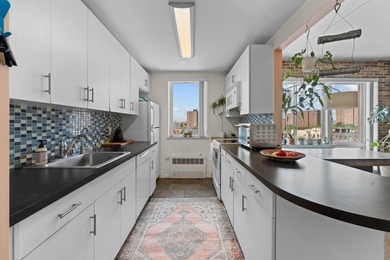 Welcome to 853 Macy Place #8E, a rare top-floor, corner - photo 4