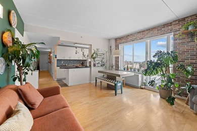 Welcome to 853 Macy Place #8E, a rare top-floor, corner - photo 7