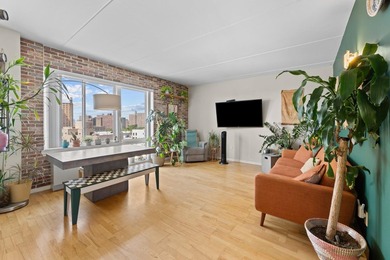 Welcome to 853 Macy Place #8E, a rare top-floor, corner - photo 8