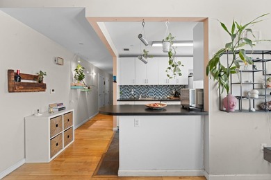 Welcome to 853 Macy Place #8E, a rare top-floor, corner - photo 9