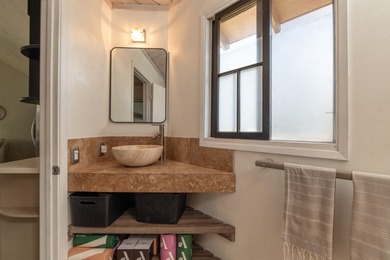 Homes on Laulea in Old Spreckelsville are a rare find; these - photo 12