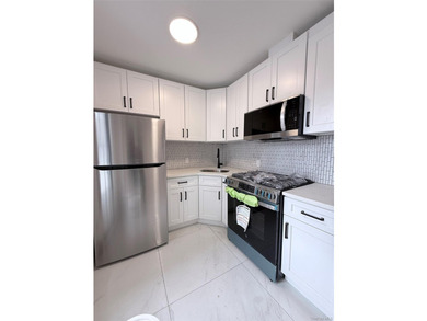 Welcome to this beautifully renovated one-family home with an - photo 5