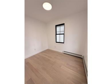 Welcome to this beautifully renovated one-family home with an - photo 6