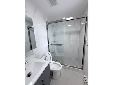 Welcome to this beautifully renovated one-family home with an - photo 9