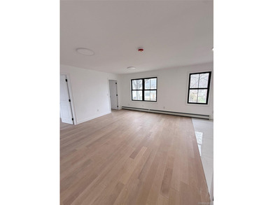 Welcome to this beautifully renovated one-family home with an - photo 10