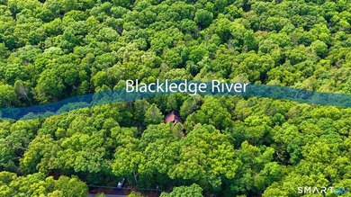 Tucked away in a peaceful wooded setting along the Blackledge - photo 2