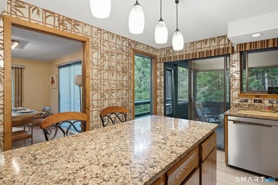 Tucked away in a peaceful wooded setting along the Blackledge - photo 6