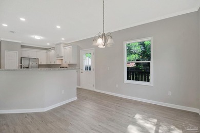 Completely renovated and move-in ready. This 3-bedroom, 2-bath - photo 7