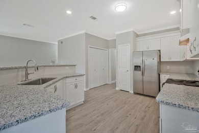 Completely renovated and move-in ready. This 3-bedroom, 2-bath - photo 8