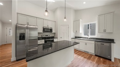 IN THE HEART OF OSAGE BEACH, your Lake of the Ozarks life starts - photo 12