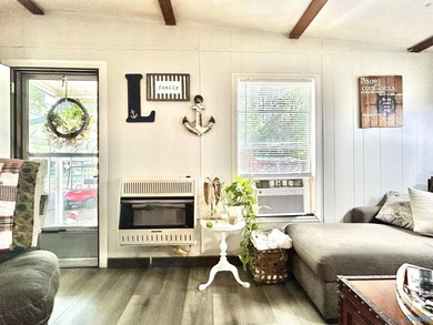Enjoy lakeside living in this charming 3-bed / 1.5-bath mfg home - photo 18