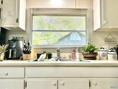 Enjoy lakeside living in this charming 3-bed / 1.5-bath mfg home - photo 20