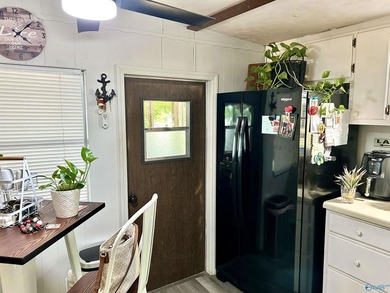 Enjoy lakeside living in this charming 3-bed / 1.5-bath mfg home - photo 22