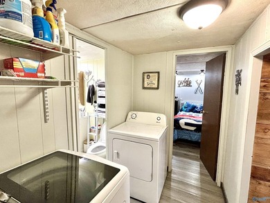 Enjoy lakeside living in this charming 3-bed / 1.5-bath mfg home - photo 24
