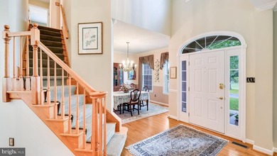 Welcome to this gorgeous Colonial nestled within the prestigious - photo 3