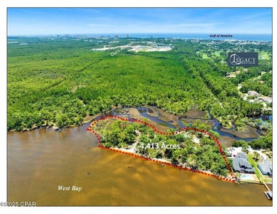 Gorgeous +/-4.4 acre secluded property on West Bay. Located at - photo 1
