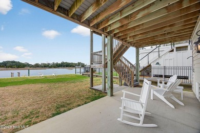 Coastal living and exceptional waterfront access define this