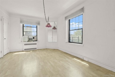 Welcome to 109-14 Ascan Avenue, Unit 5A, a bright and inviting - photo 17
