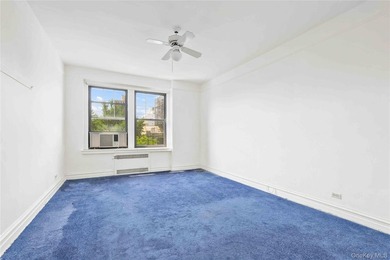 Welcome to 109-14 Ascan Avenue, Unit 5A, a bright and inviting - photo 21