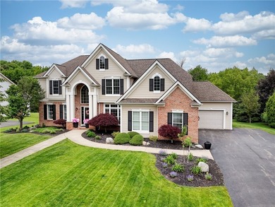 Stunning custom built Colonial nestled in one of Penfield's most - photo 1