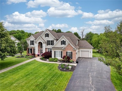 Stunning custom built Colonial nestled in one of Penfield's most - photo 3