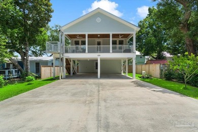 Welcome to coastal living in Bear Point. This beautifully