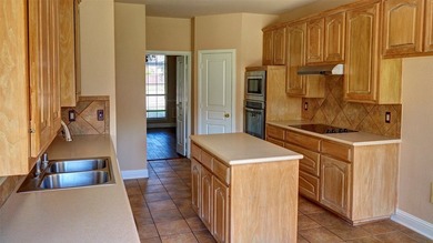 Welcome to this spacious 6-bedroom, 3.5-bath home in one of The - photo 10