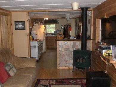 Located on a corner lot, this neat and clean ranch offers easy - photo 3