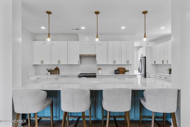 Welcome to your dream home at 1508 Marsh Cove Ln, a stunning