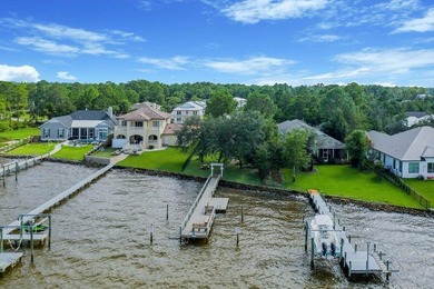 Discover Pelican Bay's Bayfront community, a serene, gated - photo 11