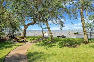 Discover Pelican Bay's Bayfront community, a serene, gated - photo 13