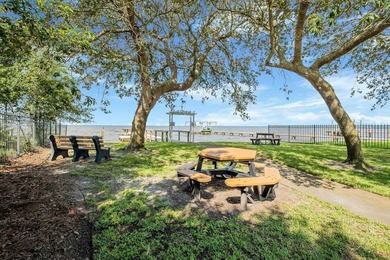 Discover Pelican Bay's Bayfront community, a serene, gated - photo 14