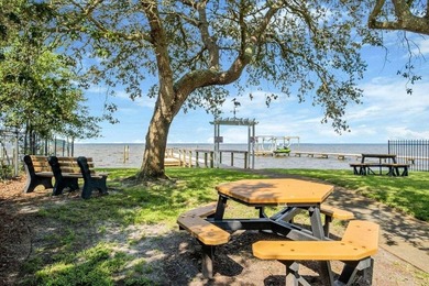 Discover Pelican Bay's Bayfront community, a serene, gated - photo 15