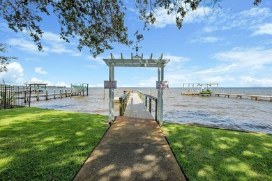 Discover Pelican Bay's Bayfront community, a serene, gated - photo 17