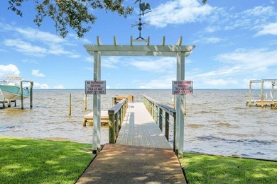 Discover Pelican Bay's Bayfront community, a serene, gated - photo 18