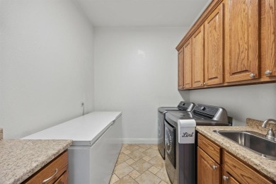 Welcome to this stunning 4,131 sq ft home nestled on a