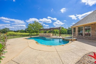 Welcome to this stunning 4,131 sq ft home nestled on a