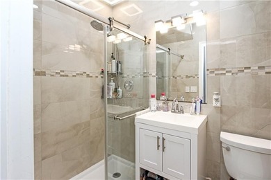 Recently renovated One family attached, all brick home in a - photo 6