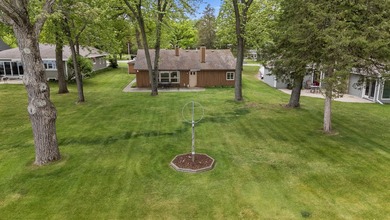 65 ft of level frontage on beautiful Pretty Lake with sunrise - photo 13