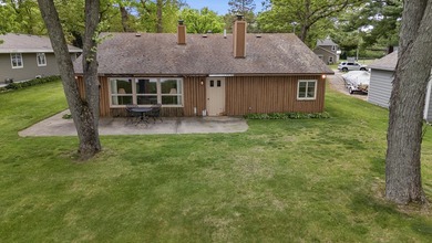65 ft of level frontage on beautiful Pretty Lake with sunrise - photo 14