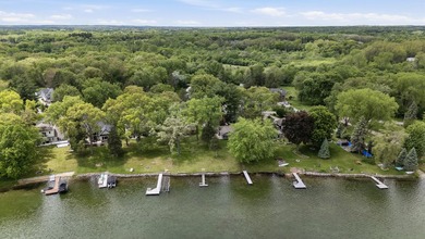 65 ft of level frontage on beautiful Pretty Lake with sunrise - photo 15