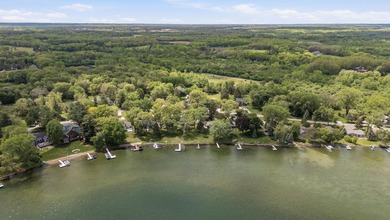 65 ft of level frontage on beautiful Pretty Lake with sunrise - photo 16