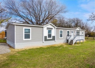 Lake Home For Sale in Pelican Bay, Texas