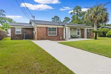 Nice 4-bedroom, 2-bath home featuring a 2023 roof, a large - photo 3