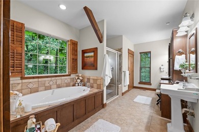 Nestled in the peaceful forest of Eureka Springs, this - photo 18