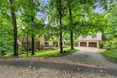 Nestled in the peaceful forest of Eureka Springs, this - photo 40