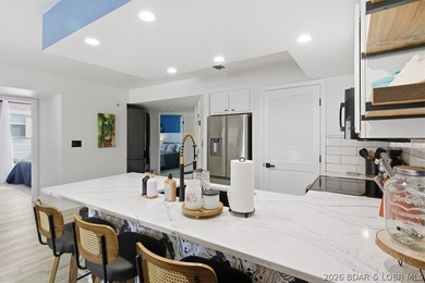 Enjoy the best of lake living in this beautifully renovated 3 - photo 2