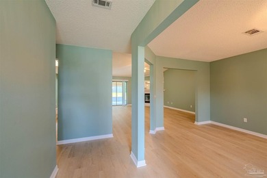 Welcome to this spacious 4-bedroom, 3-bath brick home nestled on - photo 4