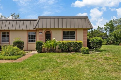 Welcome to worry-free Florida living! Tucked away in the quiet - photo 1